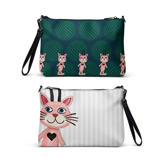 Two sides of a clutch bag with cat designs on a grey white background and blue green background